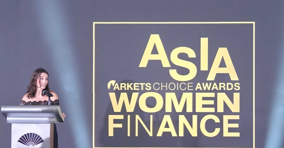 Alice Pocklington collecting Women in Finance Asia Award